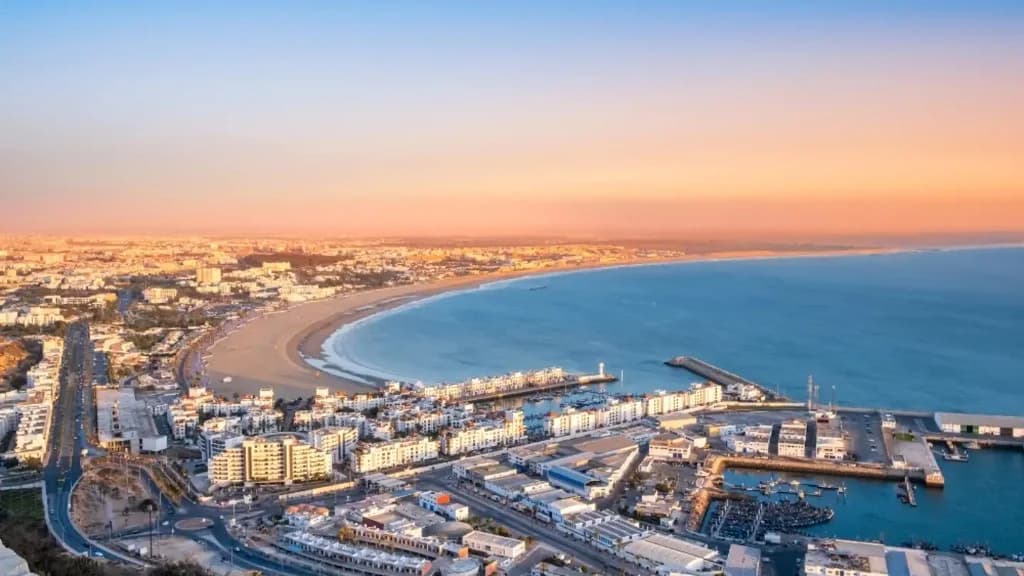 Aerial view of Agadir beach, marina and Atlantic coastline at sunset